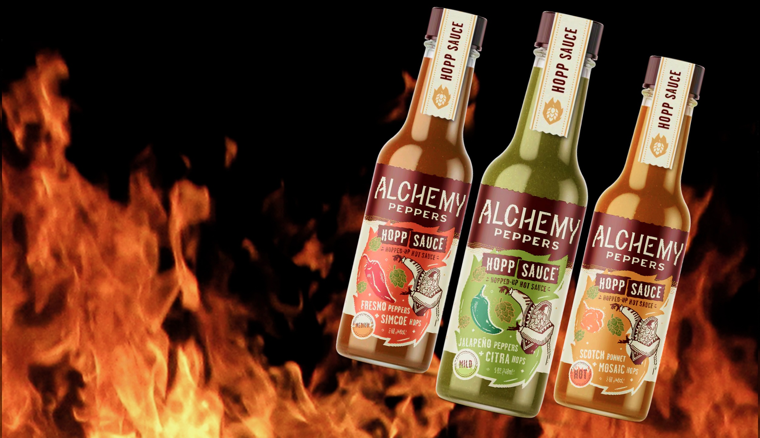 Three bottles of Alchemy Peppers hopp sauce with a fire design in the background